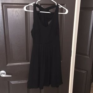 Simple black dress with cute ruffle back!