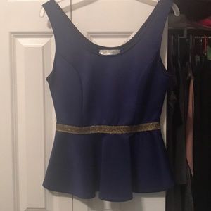 Never been worn blue peplum top!