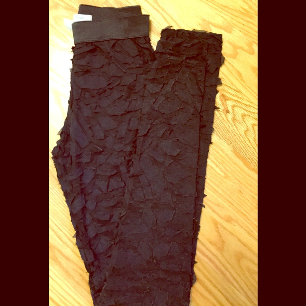 Black ruffled leggings