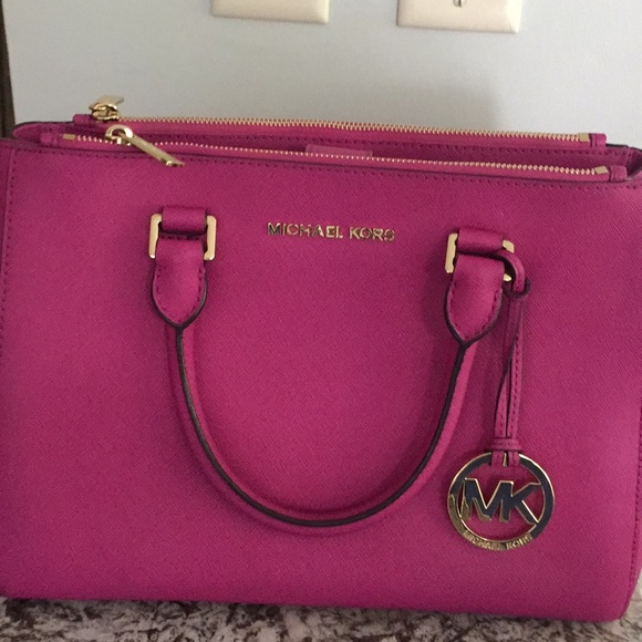 Michael Kors Handbags - Like new dark pink Authentic Michael Kors purse