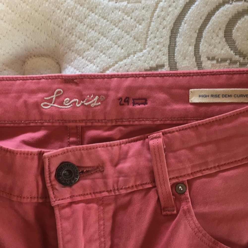 Faded salmon levis