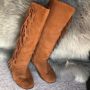 Tall fringe moccasin boots