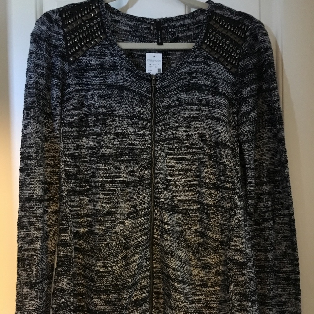 Edgy zip up sweater with metal details