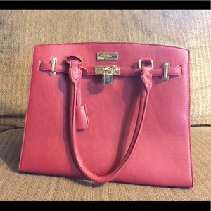 BCBG leather Purse with lock.
