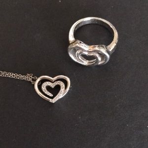 Heart shape necklace and ring with diamonds