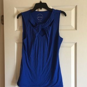 Blue sleeveless tank top with cutout design