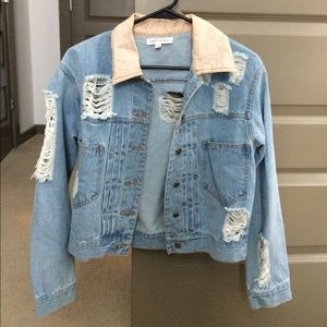 Distressed denim jacket