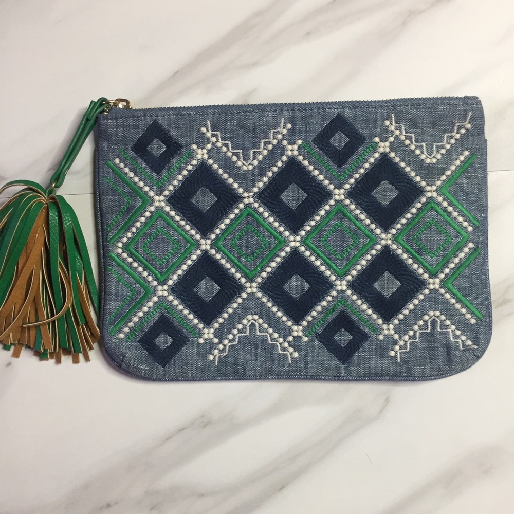 Embroidered Tassel Zip clutch