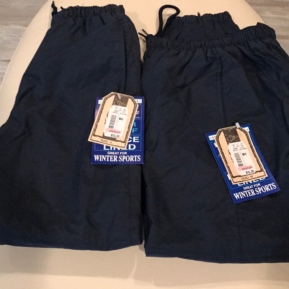 2 pair of Navy winter sport fleece lined pants