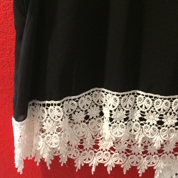 Black crop top with lace bottom. - Picture 2 of 3