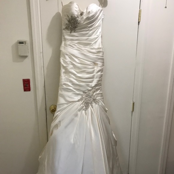 Wedding dress - never been worn or altered