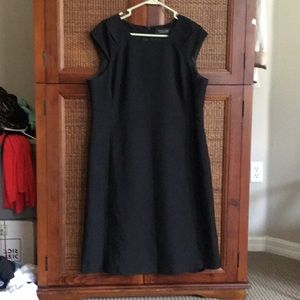 Classic black sheath style office dress lined