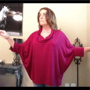 Burgundy poncho cowell neck.