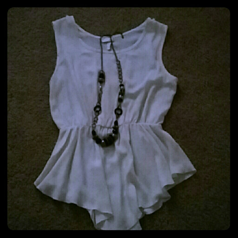 Fashion Magazine 100% polyester blouse.