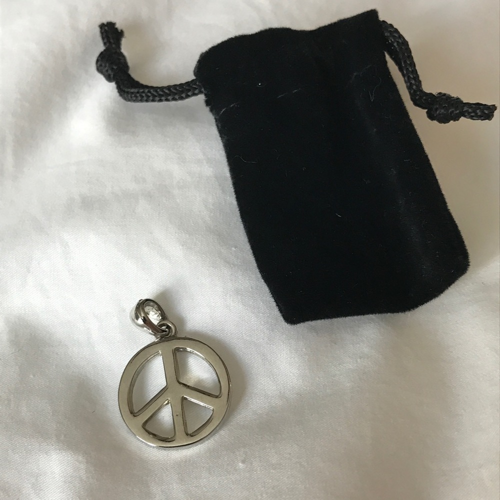Silver peace charm