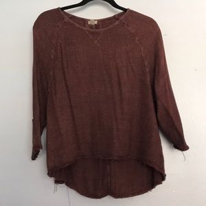 Frayed maroon sweater
