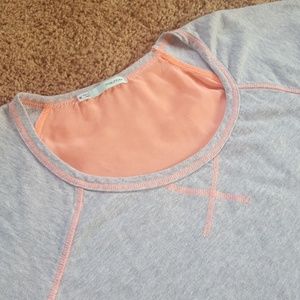 Gray and pink blouse with sheer back.