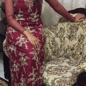Floor length net maxi with beading detailing.
