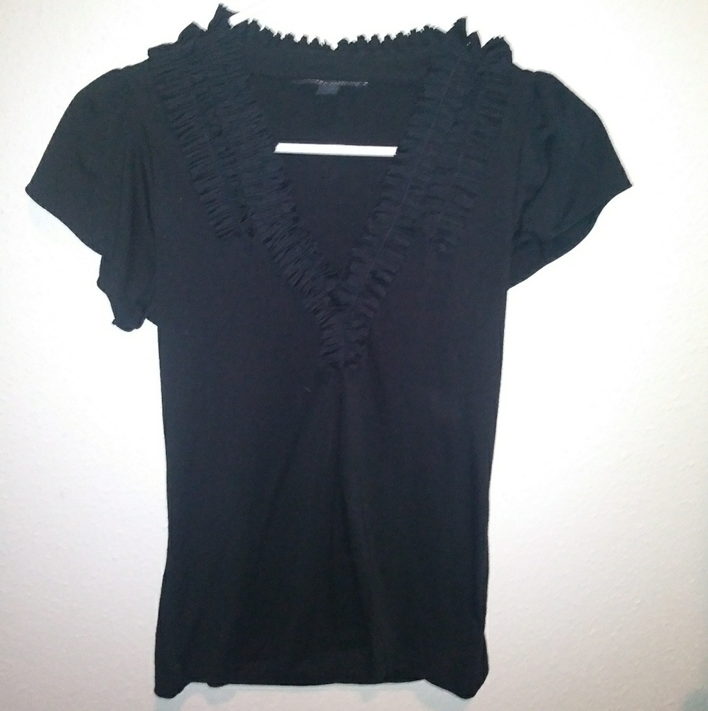 Women's black dress top with ruffle