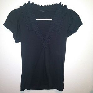 Women's black dress top with ruffle