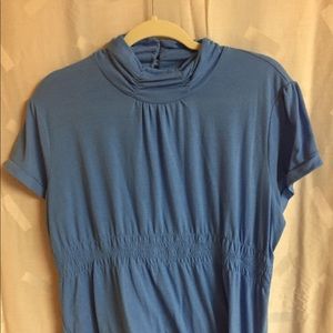 Blue mock turtleneck blouse