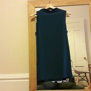 Mock turtleneck sleeveless blouse