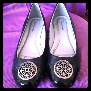 Ornate, black slip-ons