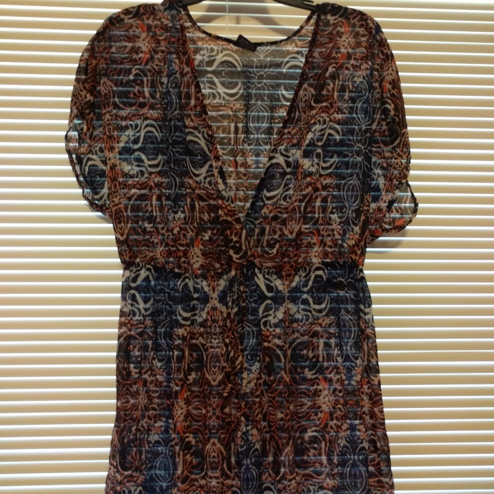 Sheer red, white, and blue blouse