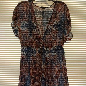 Sheer red, white, and blue blouse