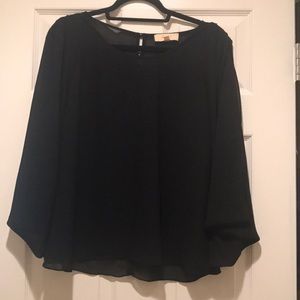 Black flow-y Blouse with cute button up back!