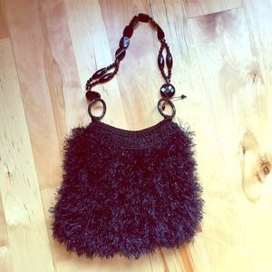 Groovy faux ostrich bag.