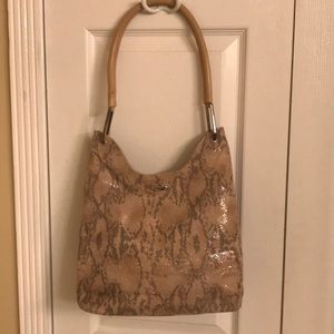 Guy Laroche snake type look and texture bag