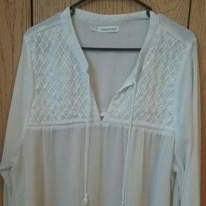 White quarter length top