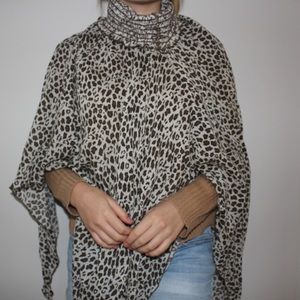 Leopard print poncho with turtleneck