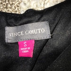 Sleeveless black top with studs