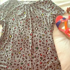 Grey top with gathered neckline and neon accents