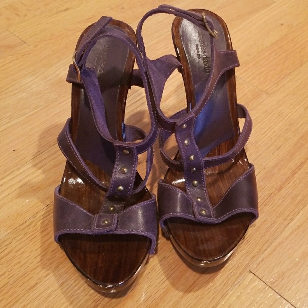 In good condition Charles David leather/wood heels