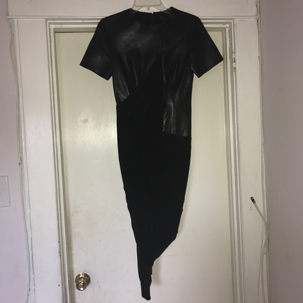 Black leather dress never worn new with tags