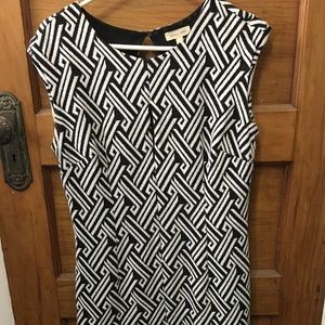 Fitted black and white patterned dress