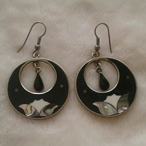 Dangle earrings with Mother of Pearl accents.