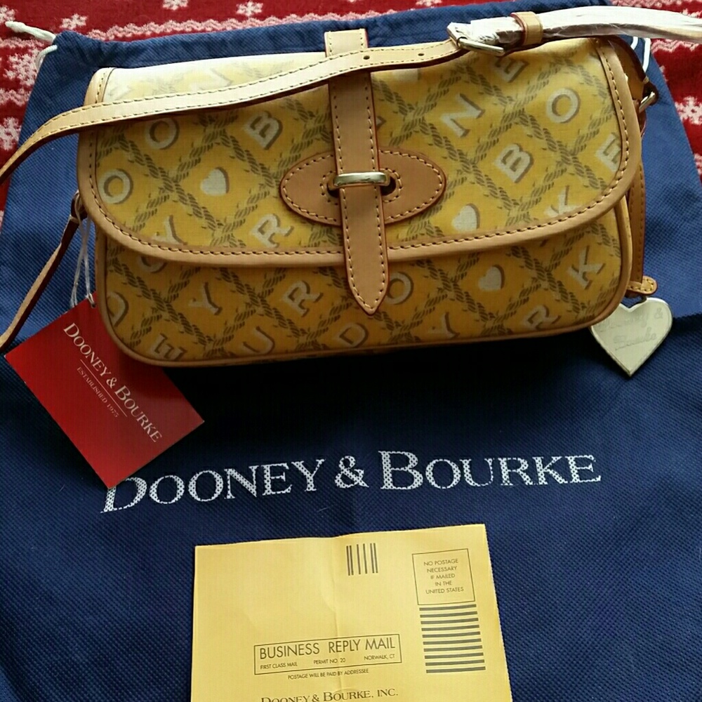 DOONEY AND BOURKE SIGNATURE CROSSWORD FLAPBAG NWT