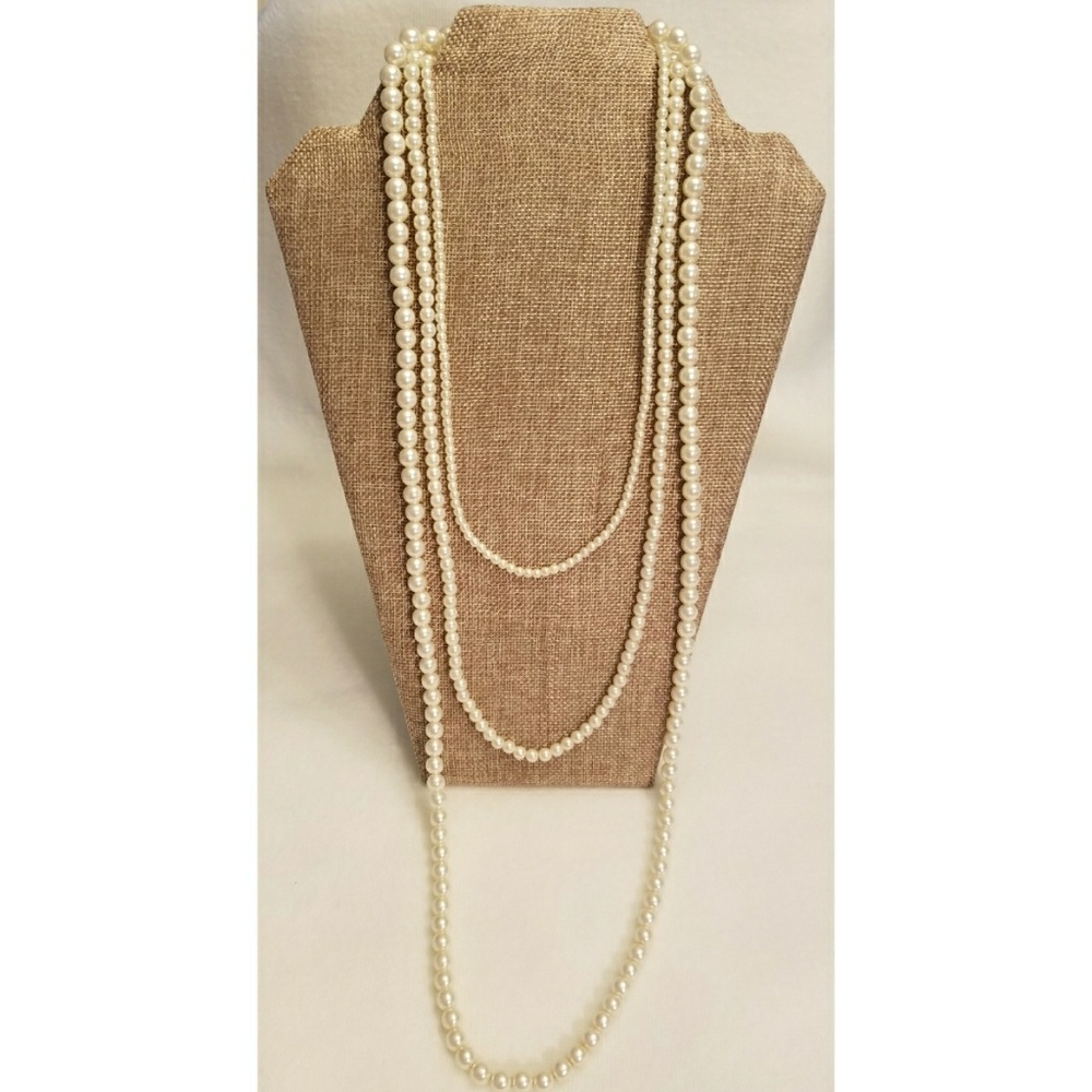 Triple strand pearl necklace