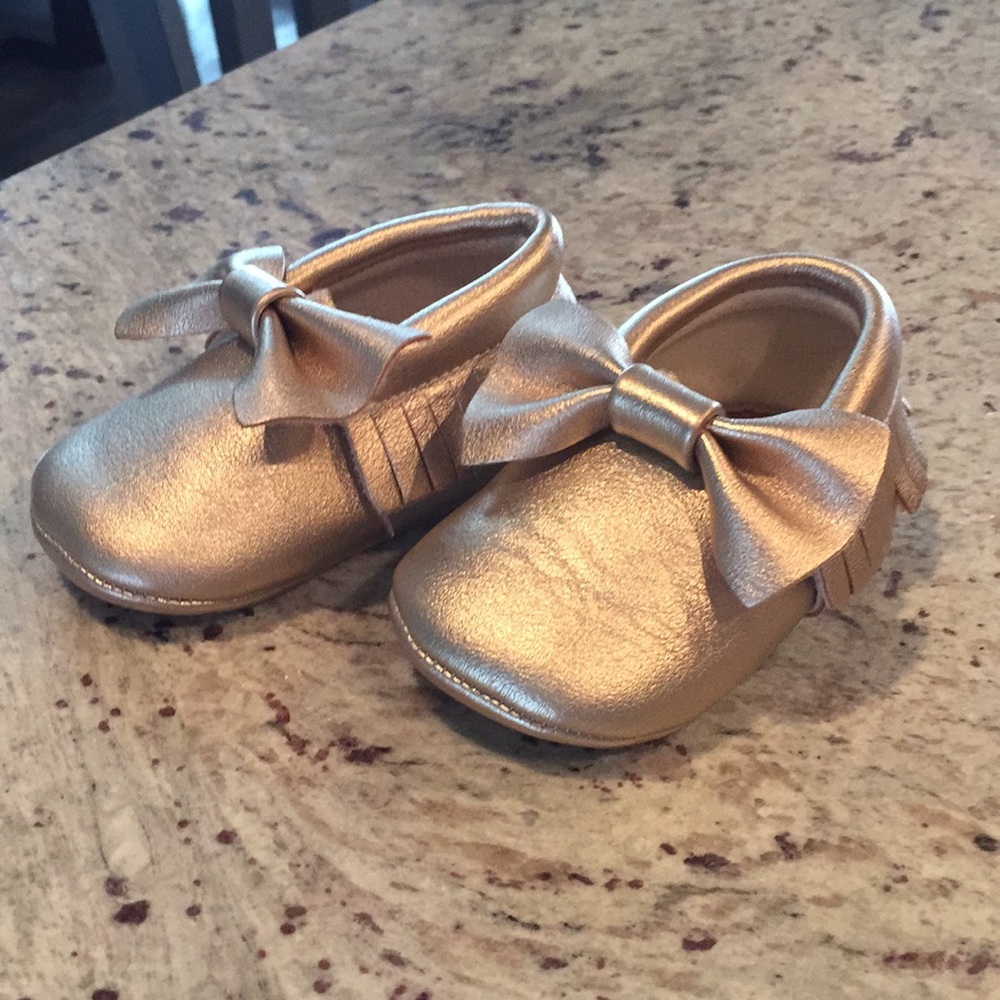 Gold moccasins