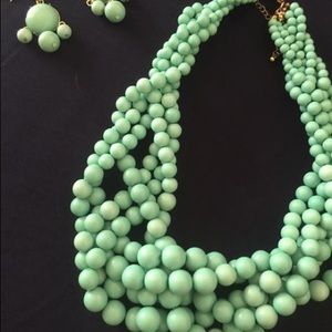 Multi strand faux pearl necklace and earrings