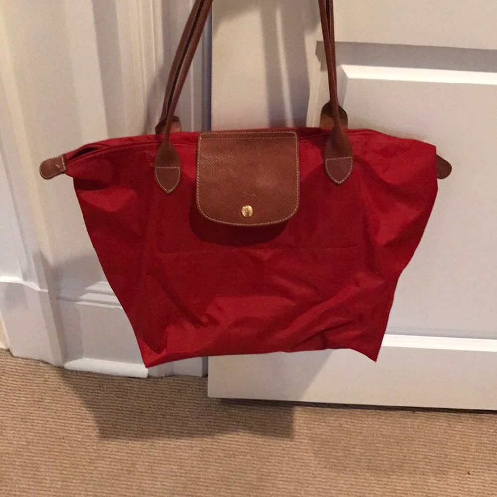 Red longchamp bag, worn in but good condition