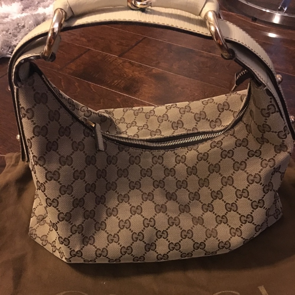 Authentic Gucci with dust bag.