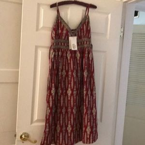 Strap dress. Comes with jacket