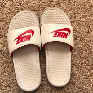white/red nike slides .