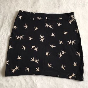 Mini black skirt with bird design
