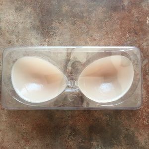 Self-adhesive cup inserts